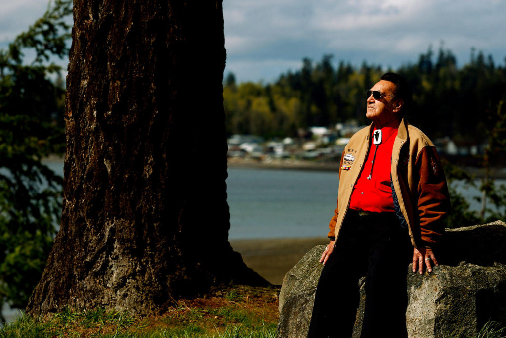 Stan Jones, Sr. scans Tulalip Bay from the grounds outside the old tribal center and longhouse April 1, 2010. He died Nov. 5. He was 93. (Dan Bates / Herald file)