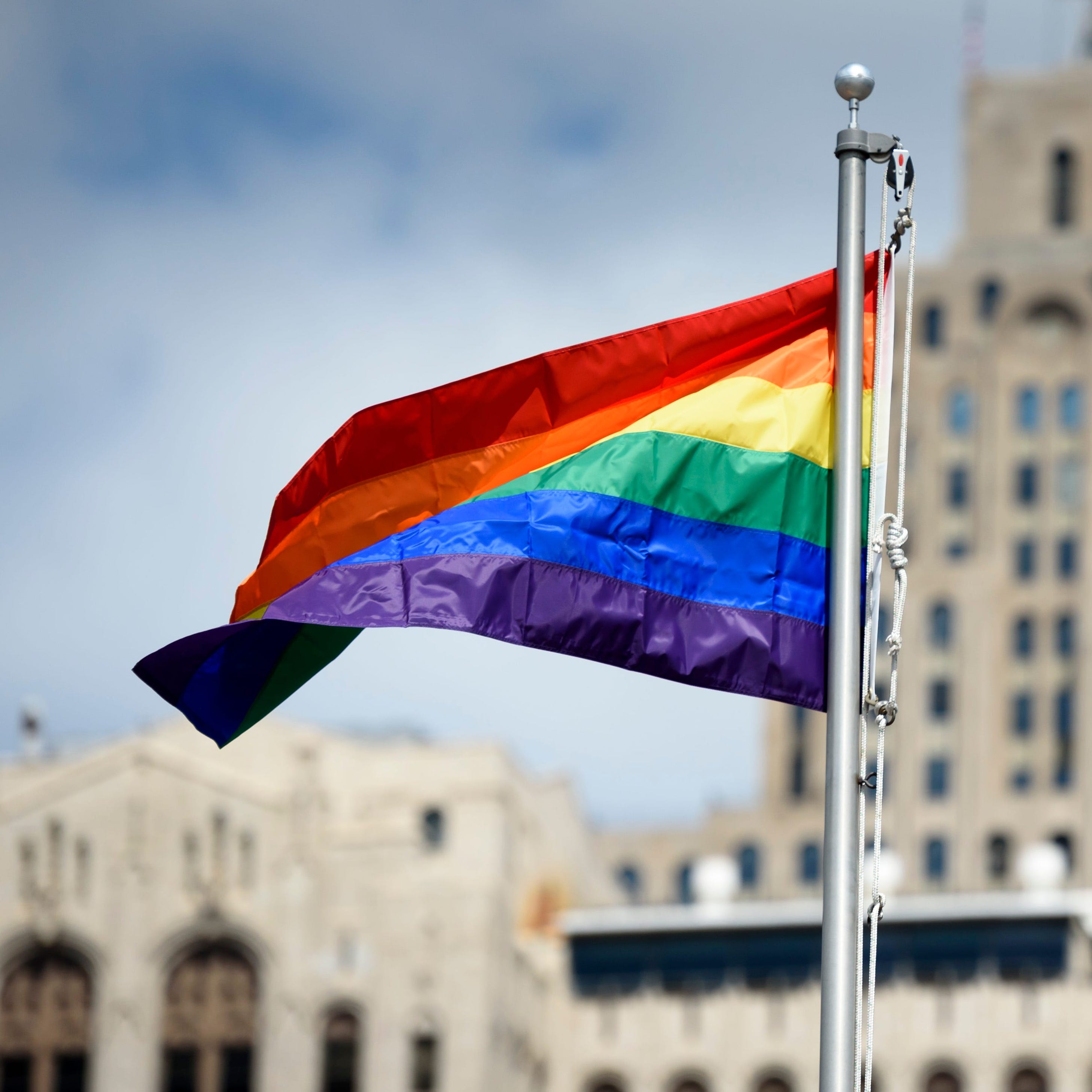 A rainbow flag flies at Motor City Pride in Detroit's Hart Plaza in 2018.
