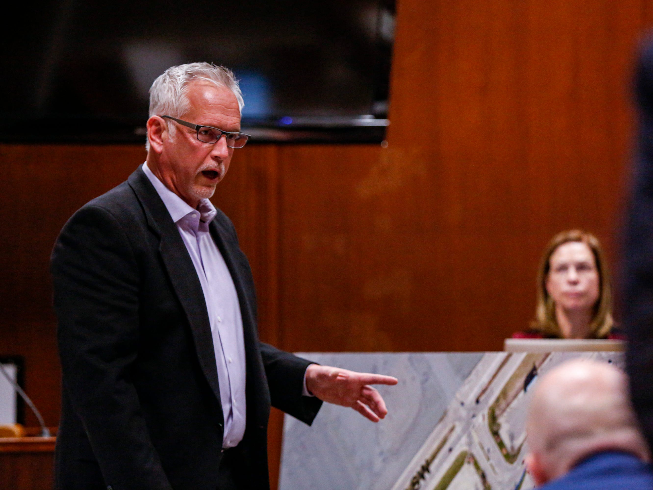 Jeffrey White, of Toddville, responds to questions while looking at a map of Westdale Mall in Cedar Rapids as it looked in 1979 during the trial of Jerry Burns at the Scott County Courthouse in Davenport on Wednesday, Feb. 12, 2020. White was at a choir banquet with Michelle Martinko the night she was killed.