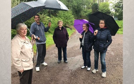 Kate’s long lost cousins Mary, Bobby, Noreen and Carmel took us on a tour of the old Village of Glenanore. Notice the umbrellas!