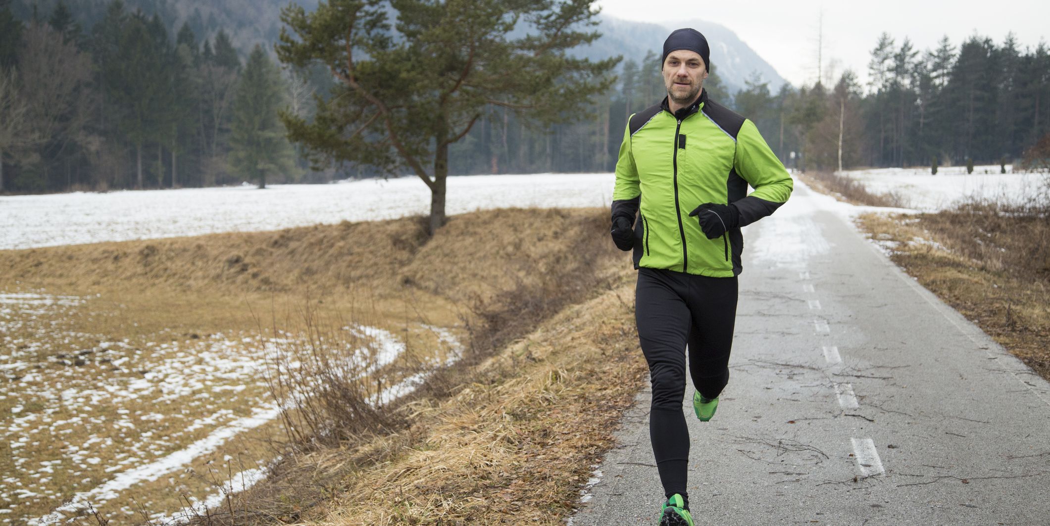 man running on road, highintensity exercise may stave off cancer