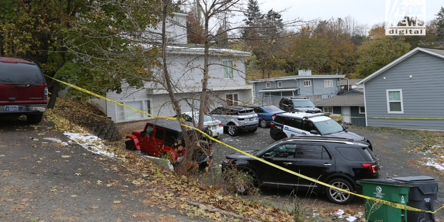 Police search a home in Moscow, Idaho on Monday, November 14, 2022, where four University of Idaho students were killed over the weekend in an apparent quadruple homicide. The victims are Ethan Chapin, 20, of Conway, Washington; Madison Mogen, 21, of Coeur d'Alene, Idaho; Xana Kernodle, 20, of Avondale, Idaho; and Kaylee Goncalves, 21, of Rathdrum, Idaho.