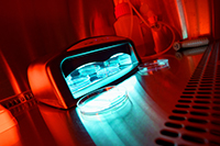 Petri dishes in a UV light device
