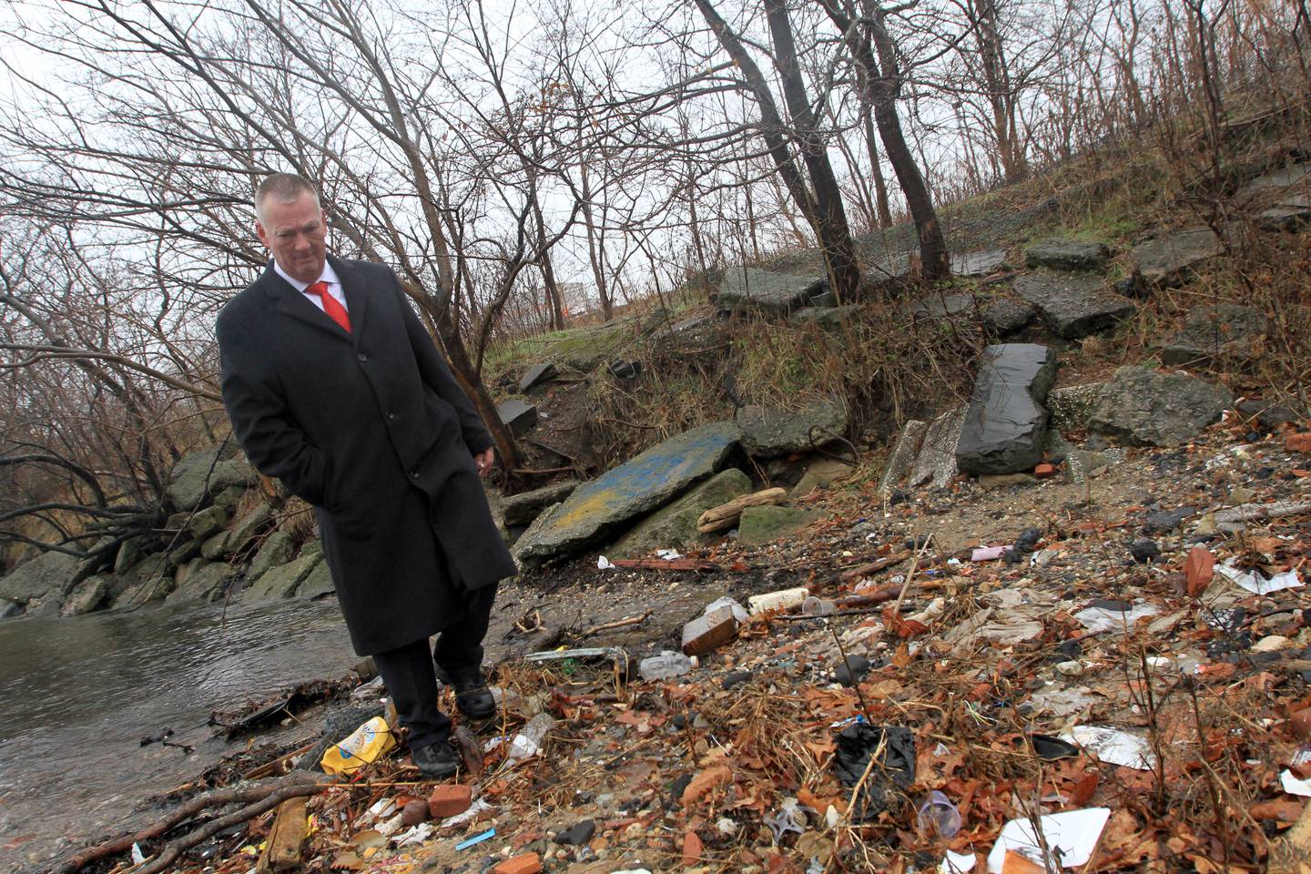 Brooklyn South Homicide Squad Detective Timothy O'Brien visits the scene at Calvert Vaux Park near the Coney Island inlet, where the scattered severed remains of an unknown woman were recovered in January 2015.